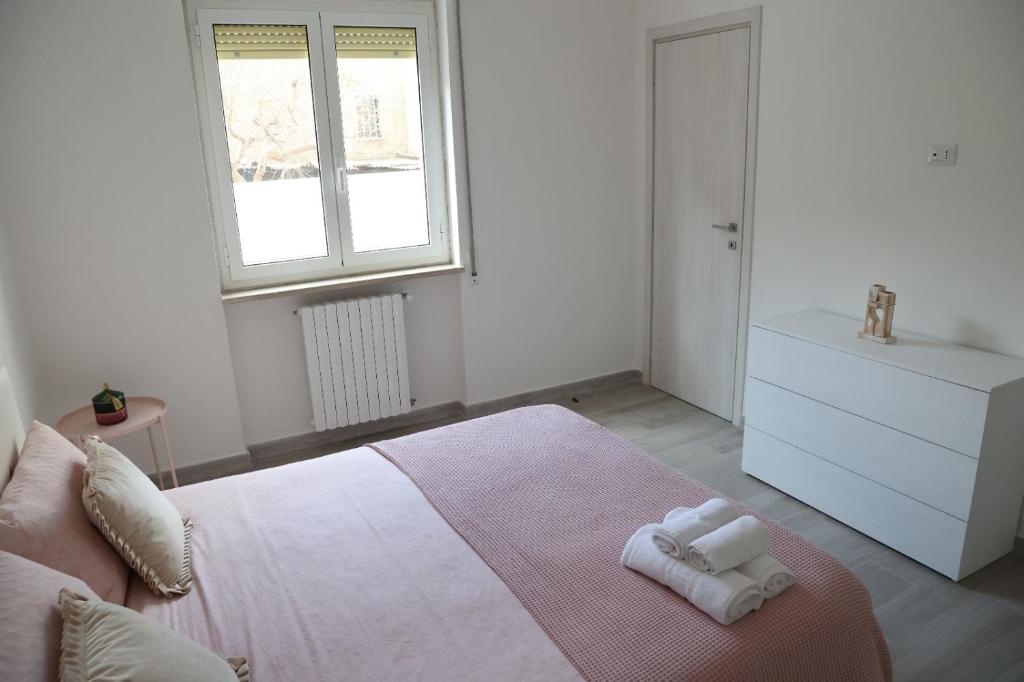 Postel nebo postele na pokoji v ubytování Sognare in Puglia