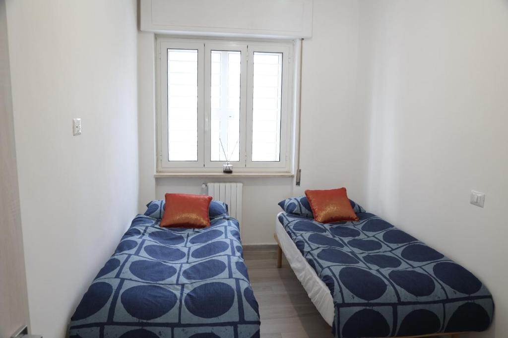 Postel nebo postele na pokoji v ubytování Sognare in Puglia