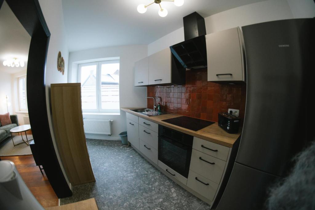 Kuchyň nebo kuchyňský kout v ubytování Capstay - Charleroi