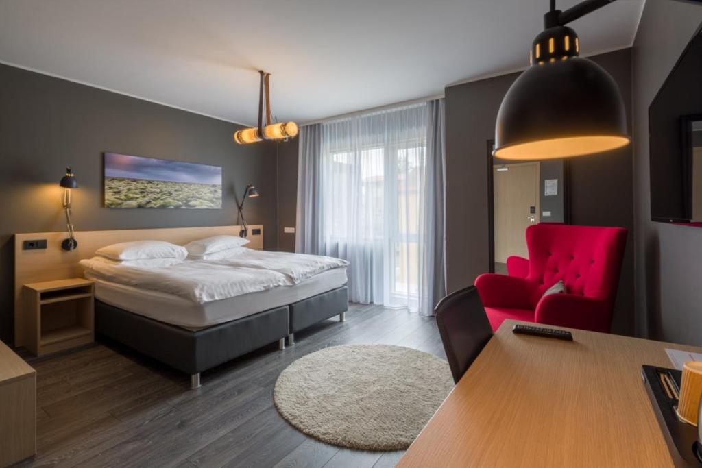 Postel nebo postele na pokoji v ubytování Alda Hotel Reykjavík