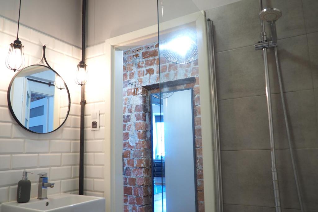 Kúpeľňa v ubytovaní Apartament Dwa Lwy Gdańsk Stare Miasto