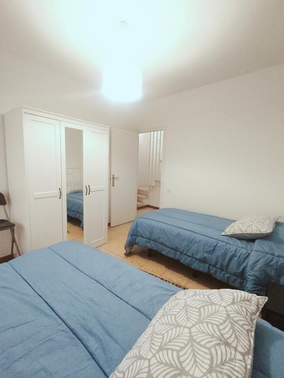 Posteľ alebo postele v izbe v ubytovaní Apartamento duplex vacacional