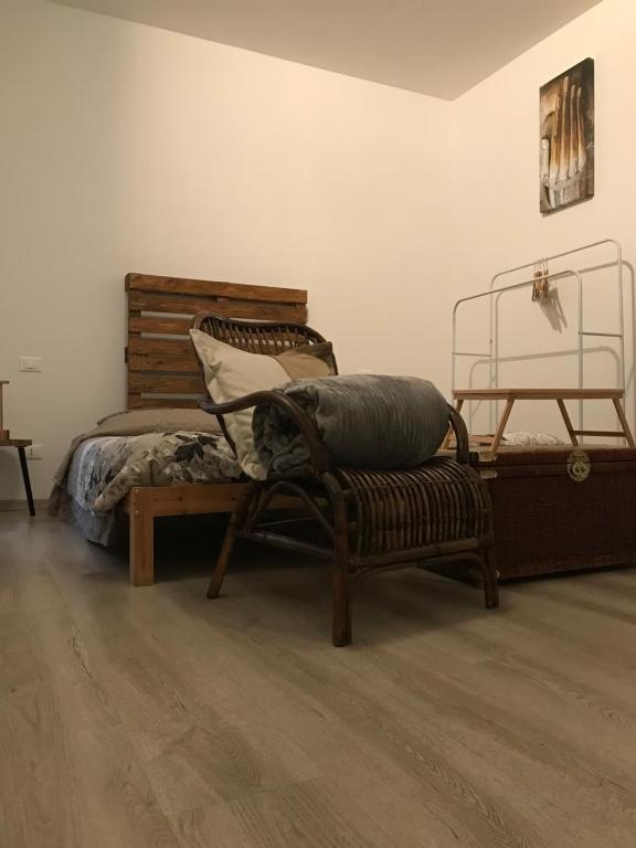 Postel nebo postele na pokoji v ubytování R&B MiDora Modena