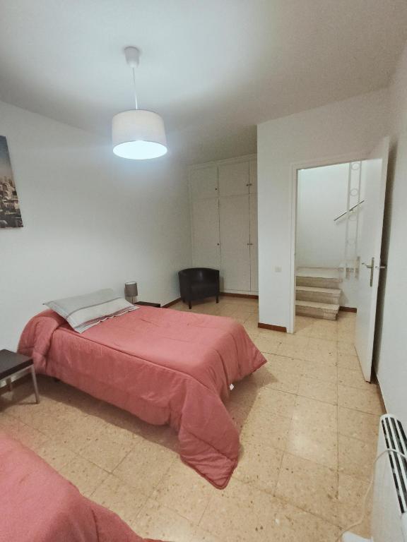 Posteľ alebo postele v izbe v ubytovaní Apartamento duplex vacacional