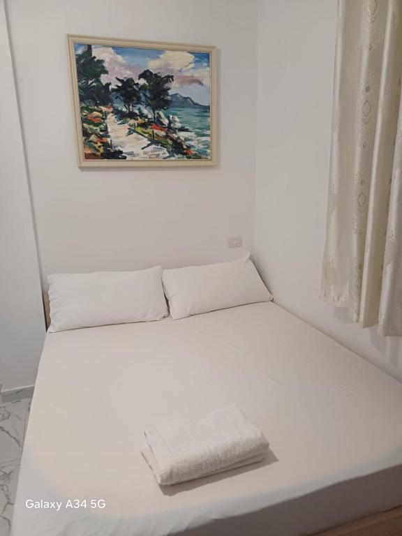 Postel nebo postele na pokoji v ubytování Hotel Sherifaj