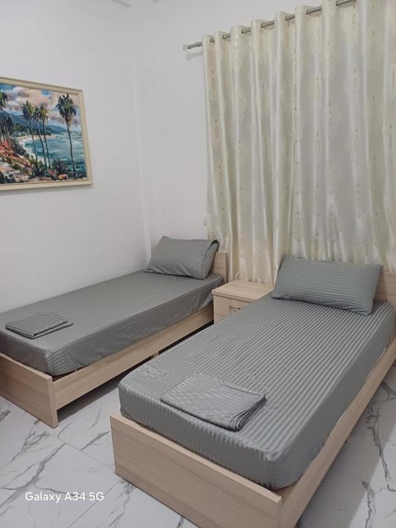 Postel nebo postele na pokoji v ubytování Hotel Sherifaj