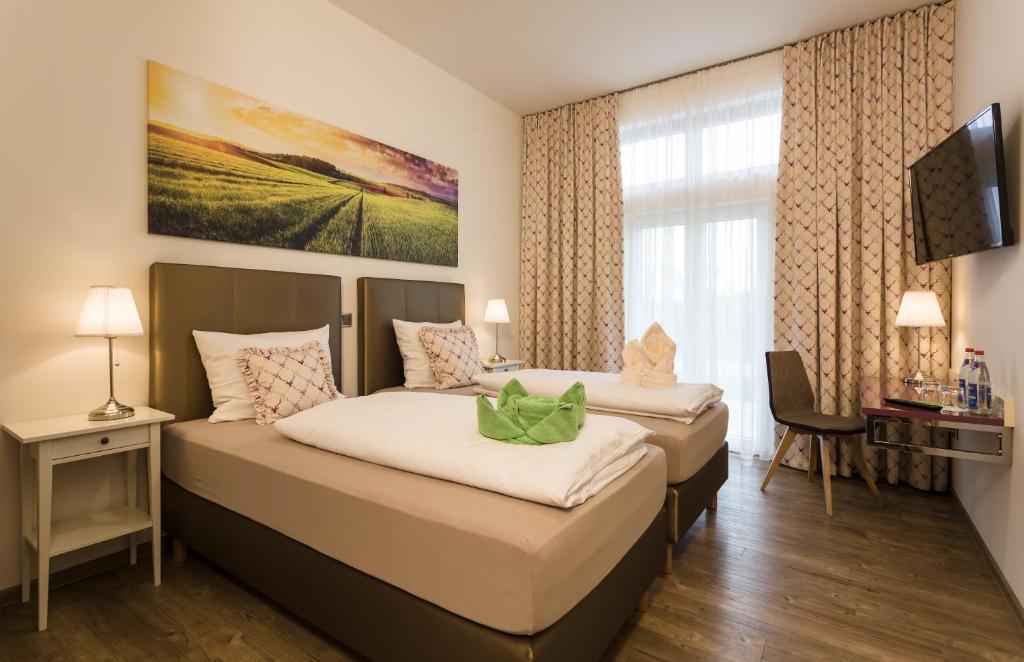 Postel nebo postele na pokoji v ubytování Wuschl Lounge