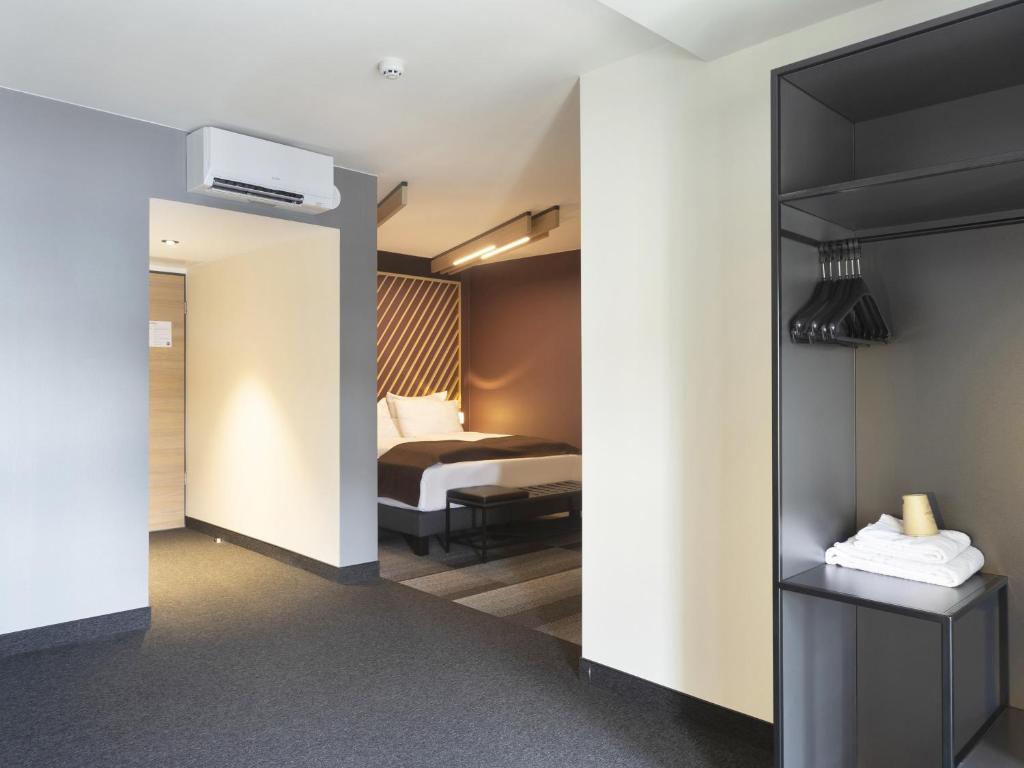 Postel nebo postele na pokoji v ubytování B&B HOTEL Gera