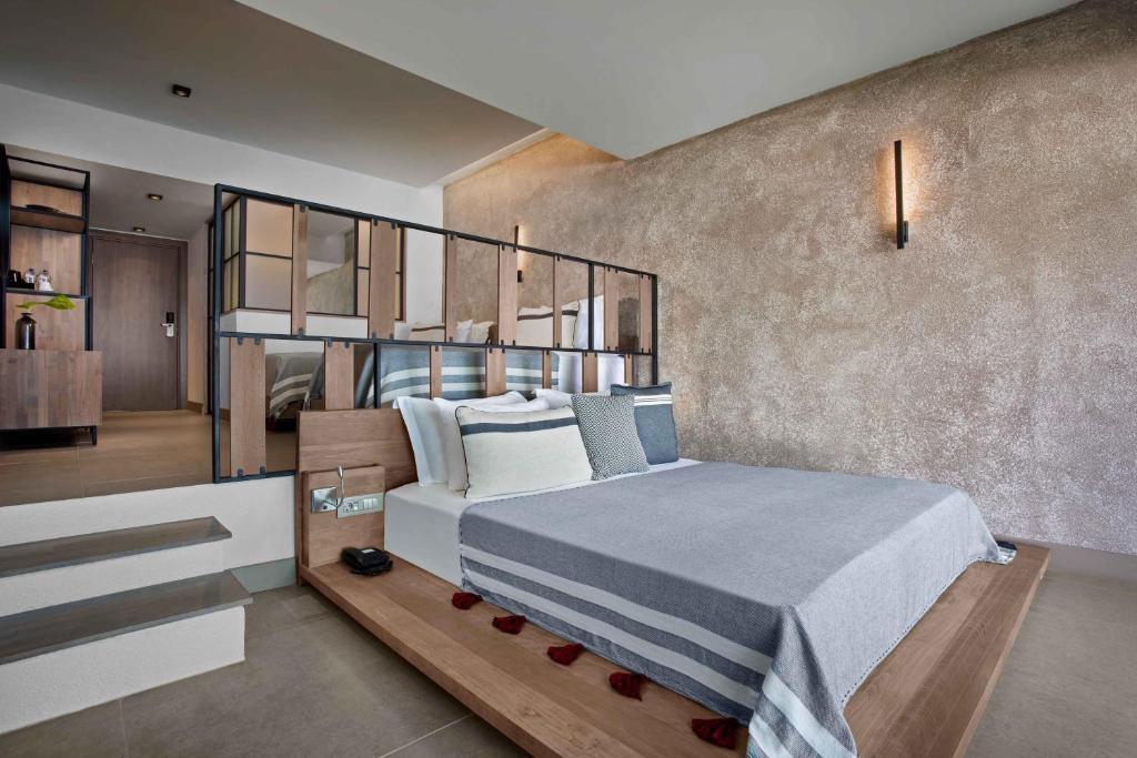 A bed or beds in a room at Club Marvy