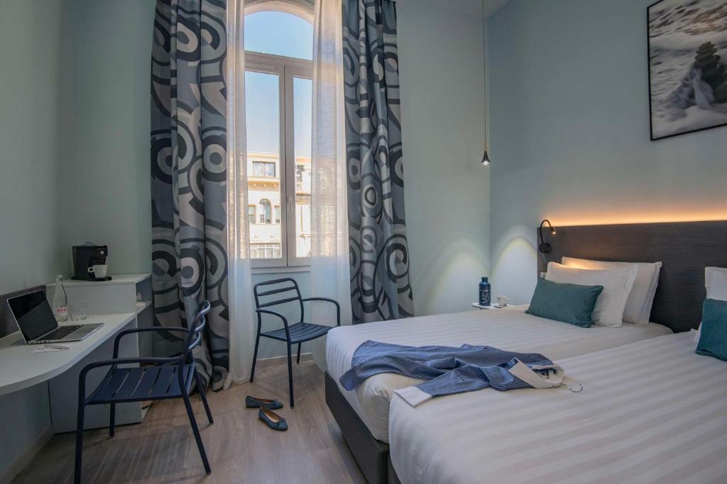Postel nebo postele na pokoji v ubytování Best Western Alba