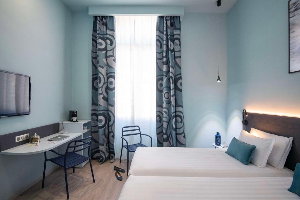 Postel nebo postele na pokoji v ubytování Best Western Alba