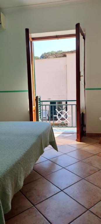 Postel nebo postele na pokoji v ubytování Sapphire Rooms