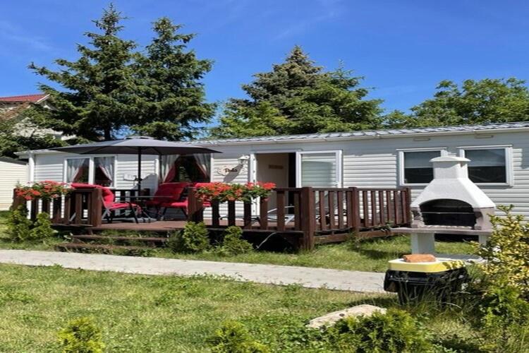 Vonkajšia záhrada v ubytovaní Mobile home in Kolczewo with a terrace