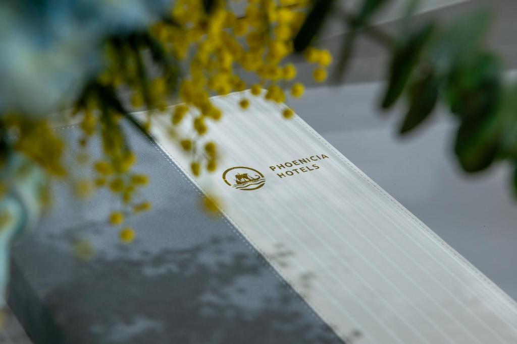 Certifikát, hodnocení, plakát nebo jiný dokument vystavený v ubytování Phoenicia Express Hotel