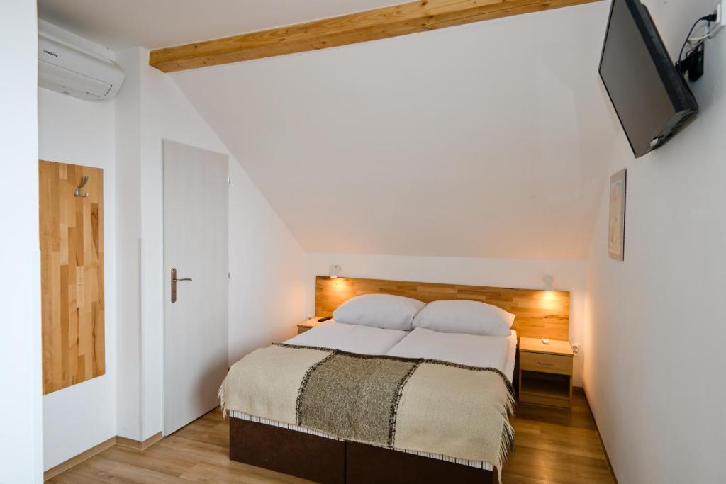 Postel nebo postele na pokoji v ubytování Wellness Vila Bohemia