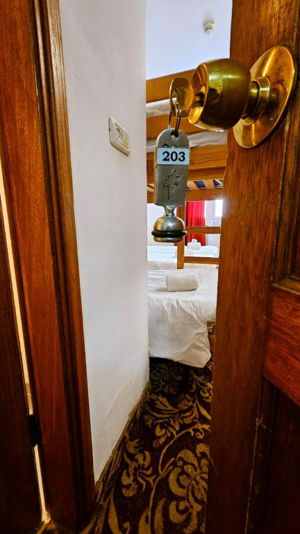 Postel nebo postele na pokoji v ubytování Zion Hotel