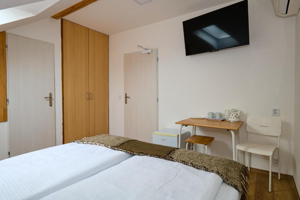 Postel nebo postele na pokoji v ubytování Wellness Vila Bohemia