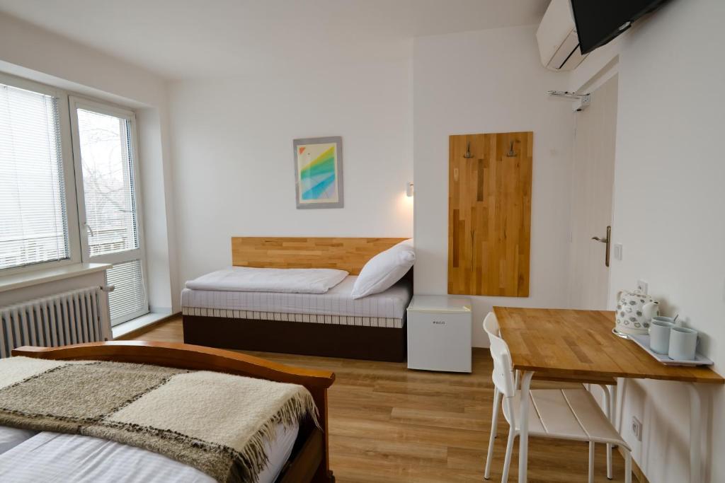 Postel nebo postele na pokoji v ubytování Wellness Vila Bohemia