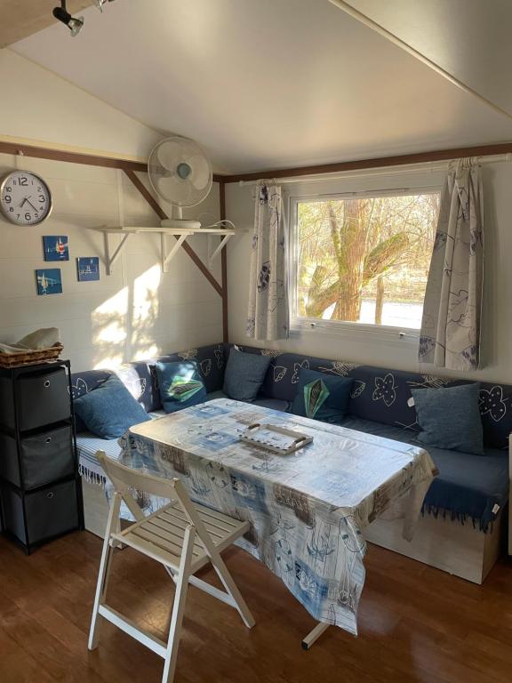 Posezení v ubytování Bungalow tout confort