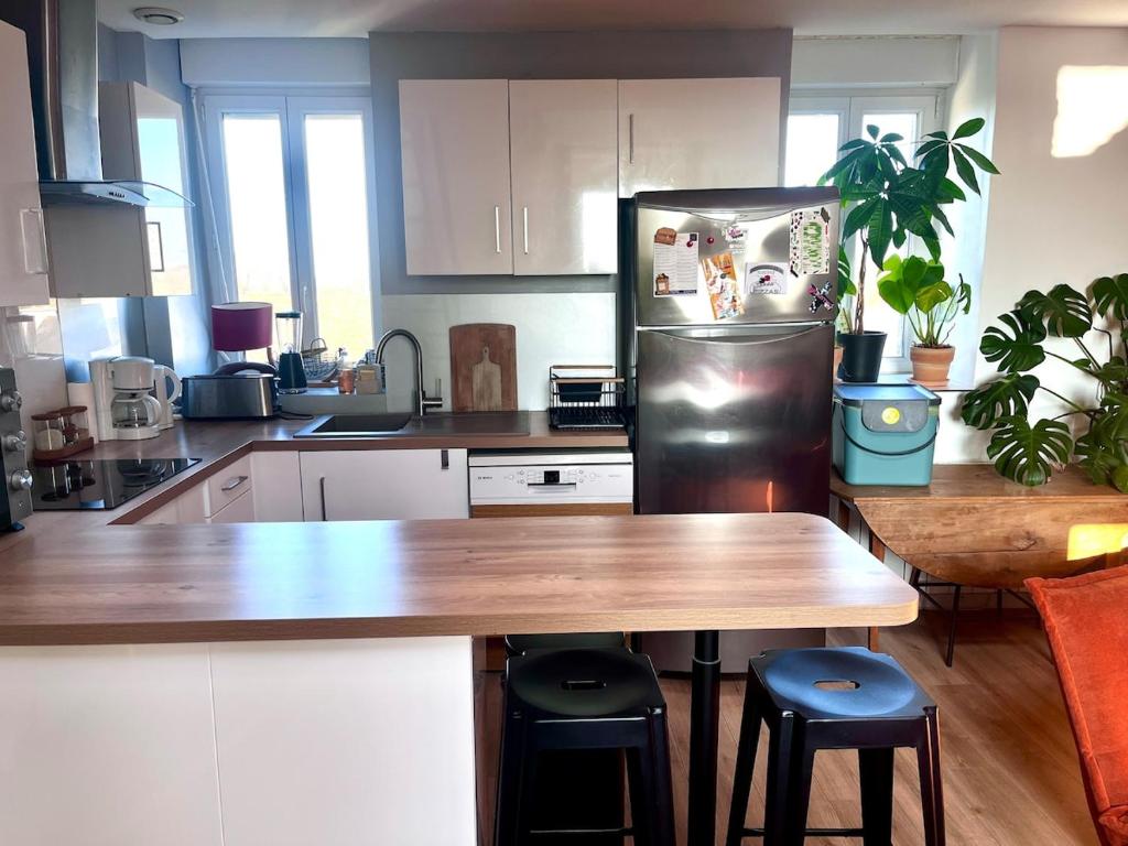 Kuchyňa alebo kuchynka v ubytovaní Bel appartement, proche plages pour 4 personnes, 2 chambres