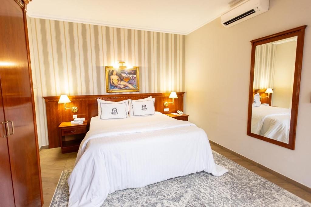 Postel nebo postele na pokoji v ubytování Hotel Waldinger