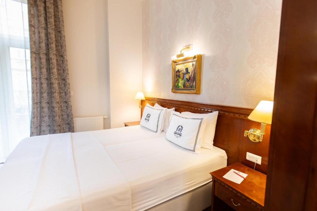 Postel nebo postele na pokoji v ubytování Hotel Waldinger