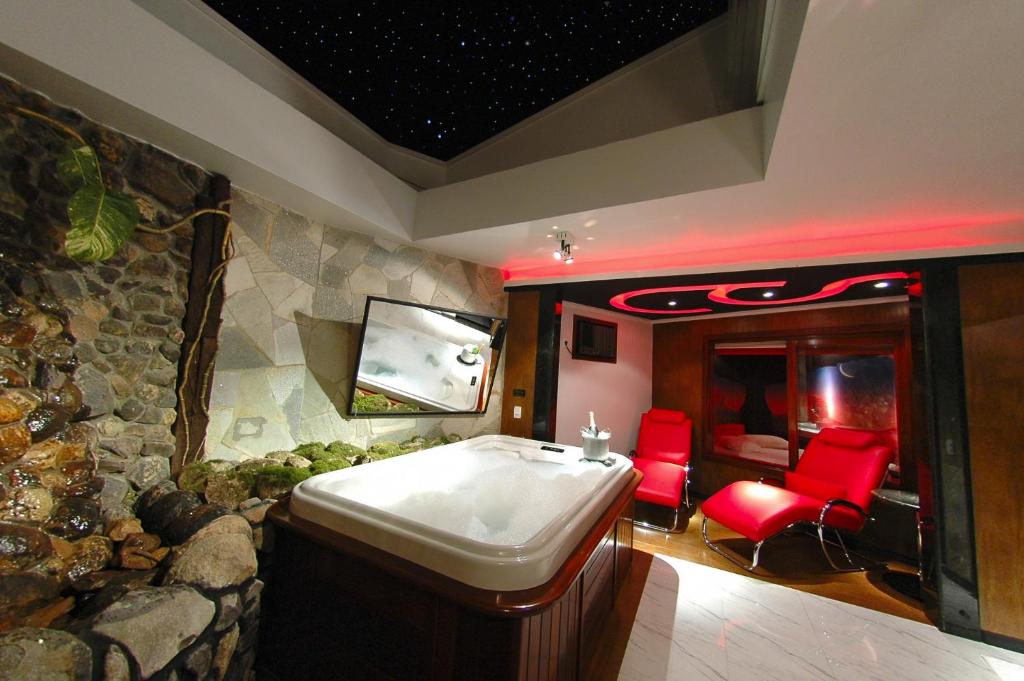 TV a/nebo společenská místnost v ubytování Motel Aquarius (Adults Only)