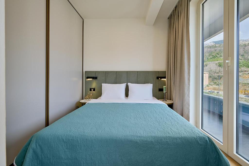Postel nebo postele na pokoji v ubytování Skyline resort