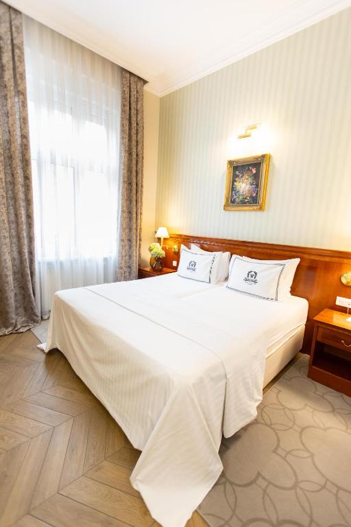 Postel nebo postele na pokoji v ubytování Hotel Waldinger