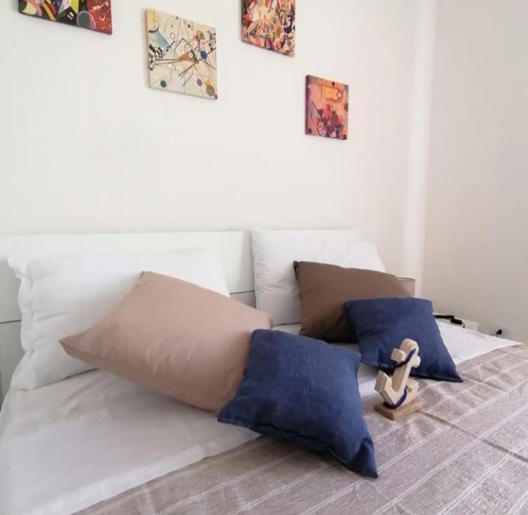 Postel nebo postele na pokoji v ubytování B&B Orizzonte Blu