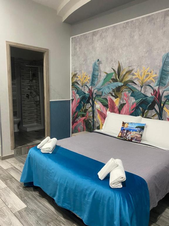 Posteľ alebo postele v izbe v ubytovaní B&B VIVA NAPOLI