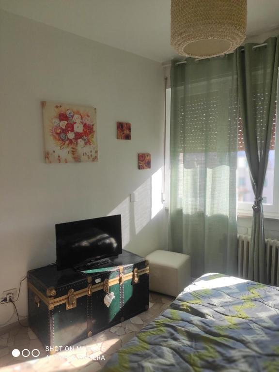 TV a/nebo společenská místnost v ubytování Casa di Ana