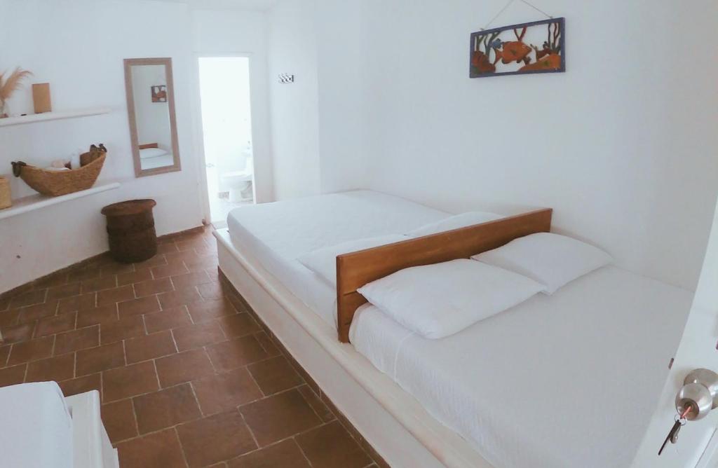 Postel nebo postele na pokoji v ubytování Quinta del Mar Crystal Beach