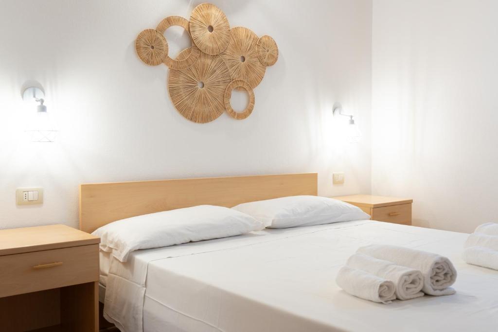 Postel nebo postele na pokoji v ubytování 4 Mori Family Village - Villaggio per Famiglie
