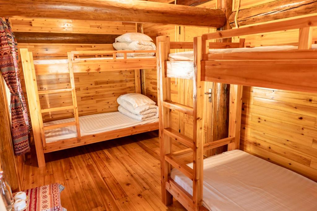Postel nebo postele na pokoji v ubytování Hmong Farmstay
