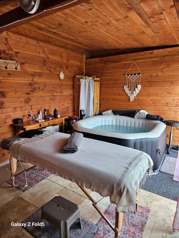 Postel nebo postele na pokoji v ubytování La détente ! Petit déjeuner inclus
