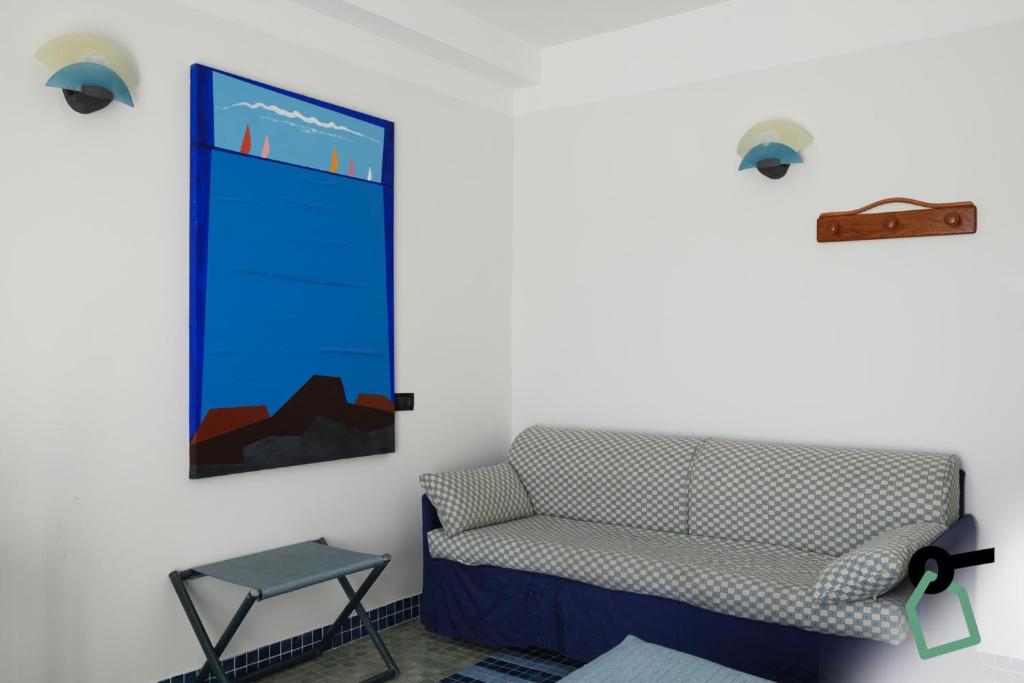 Posezení v ubytování HOTIDAY Room Collection - Le Grazie