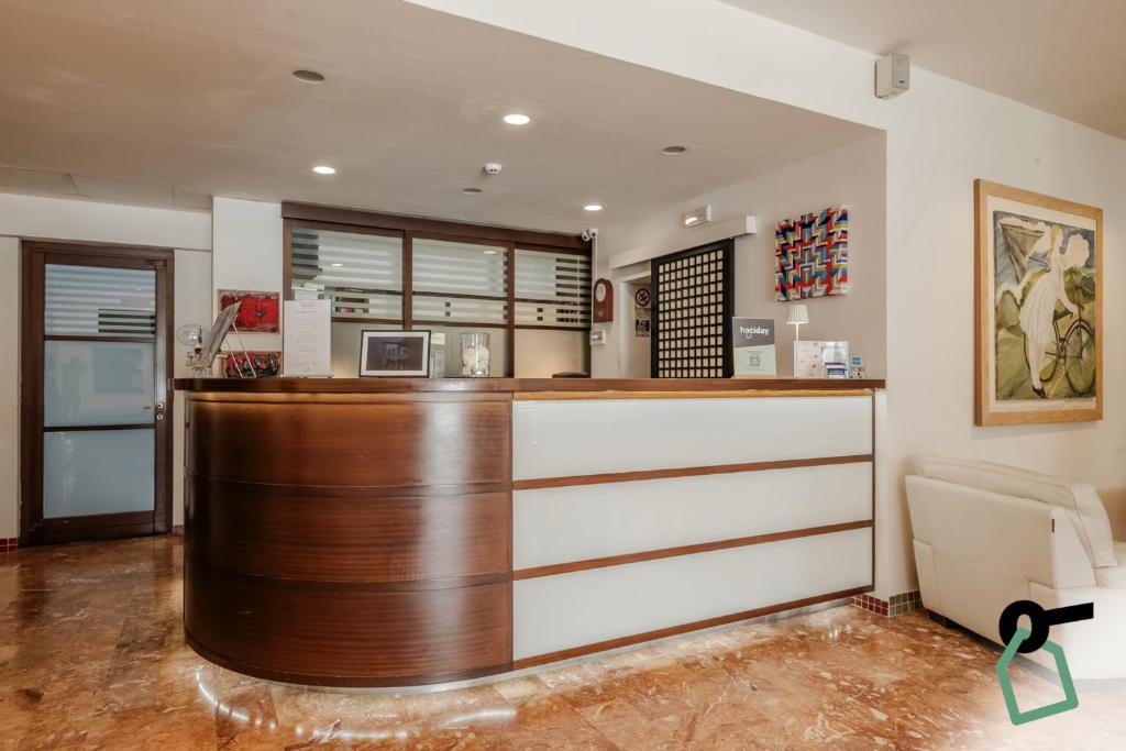 Vstupní hala nebo recepce v ubytování HOTIDAY Room Collection - Le Grazie