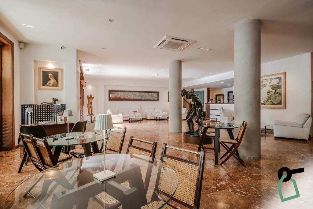 Posezení v ubytování HOTIDAY Room Collection - Le Grazie