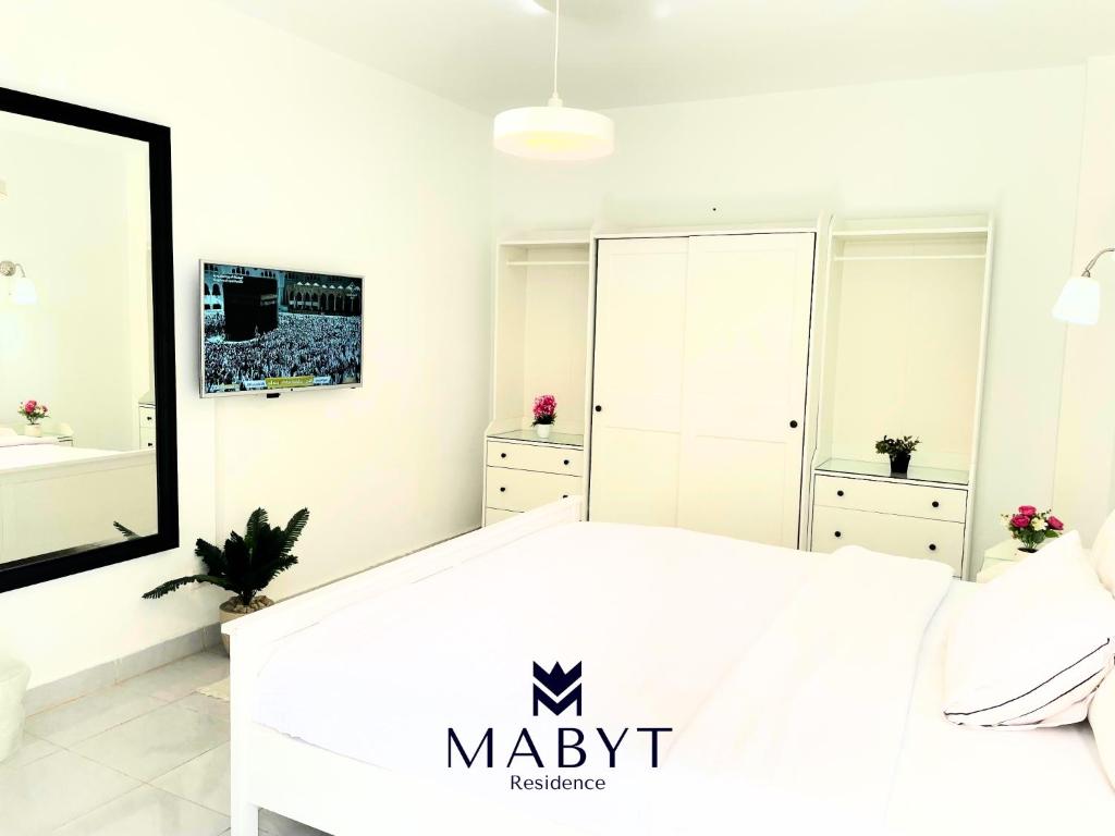 TV a/nebo společenská místnost v ubytování MABYT Residence New Cairo