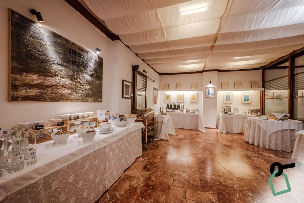 Restaurace v ubytování HOTIDAY Room Collection - Le Grazie