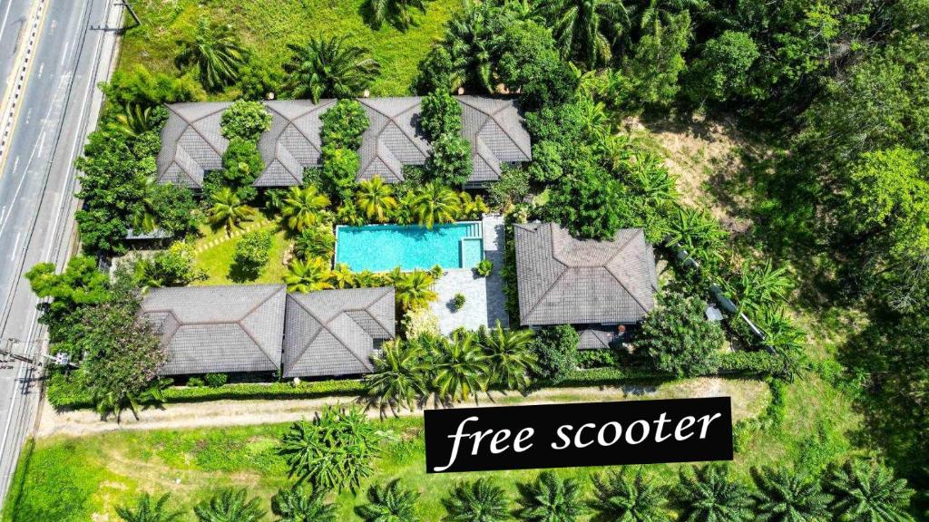 an aerial view of a house with a free scotter sign at sengjan garden krabi in Ban Khlong Son