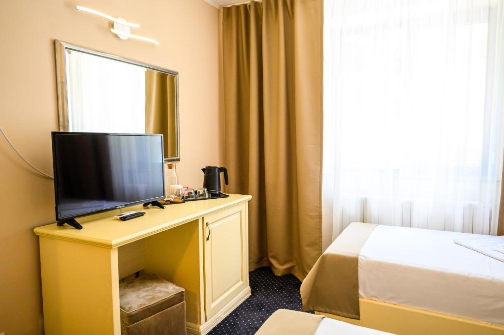 TV a/nebo společenská místnost v ubytování Hotel Bulevard