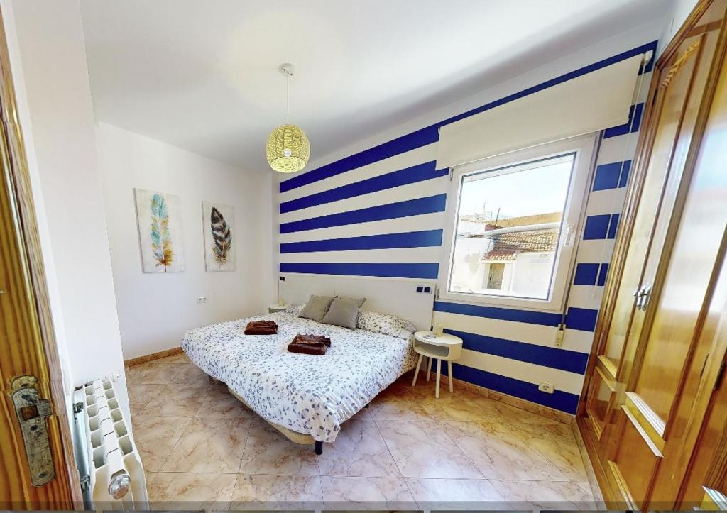 A bed or beds in a room at Vista Alegre