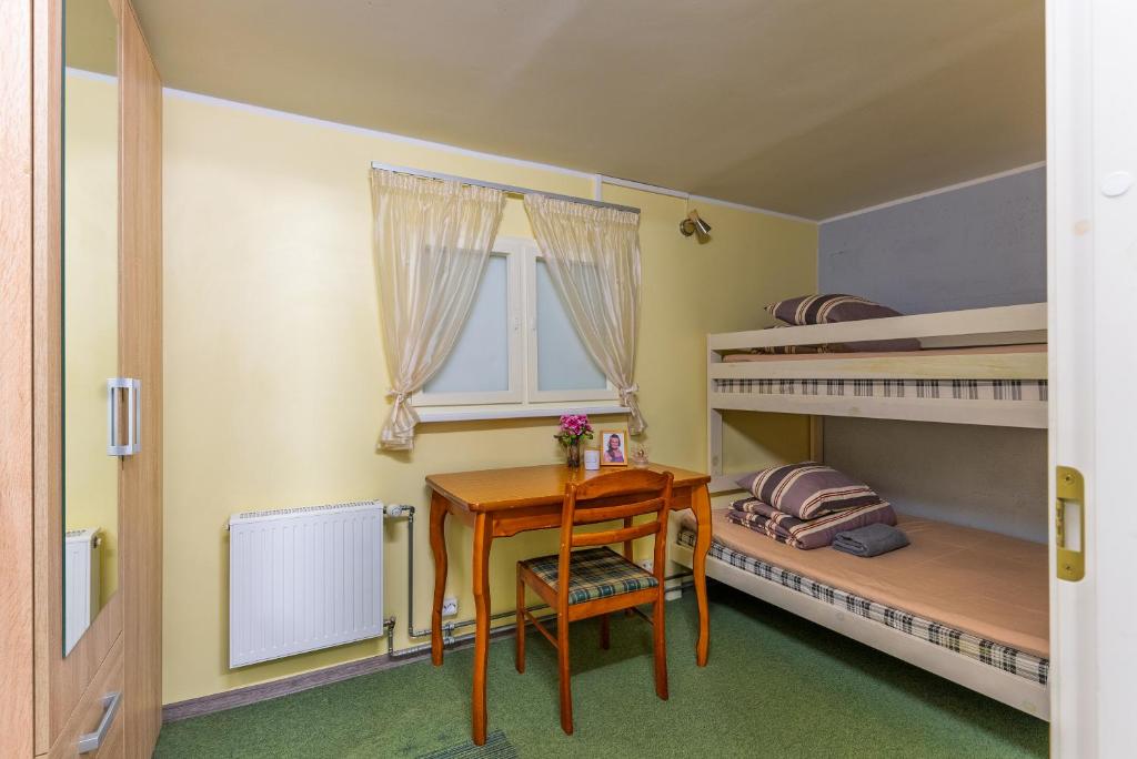 Postel nebo postele na pokoji v ubytování IDA Apartments