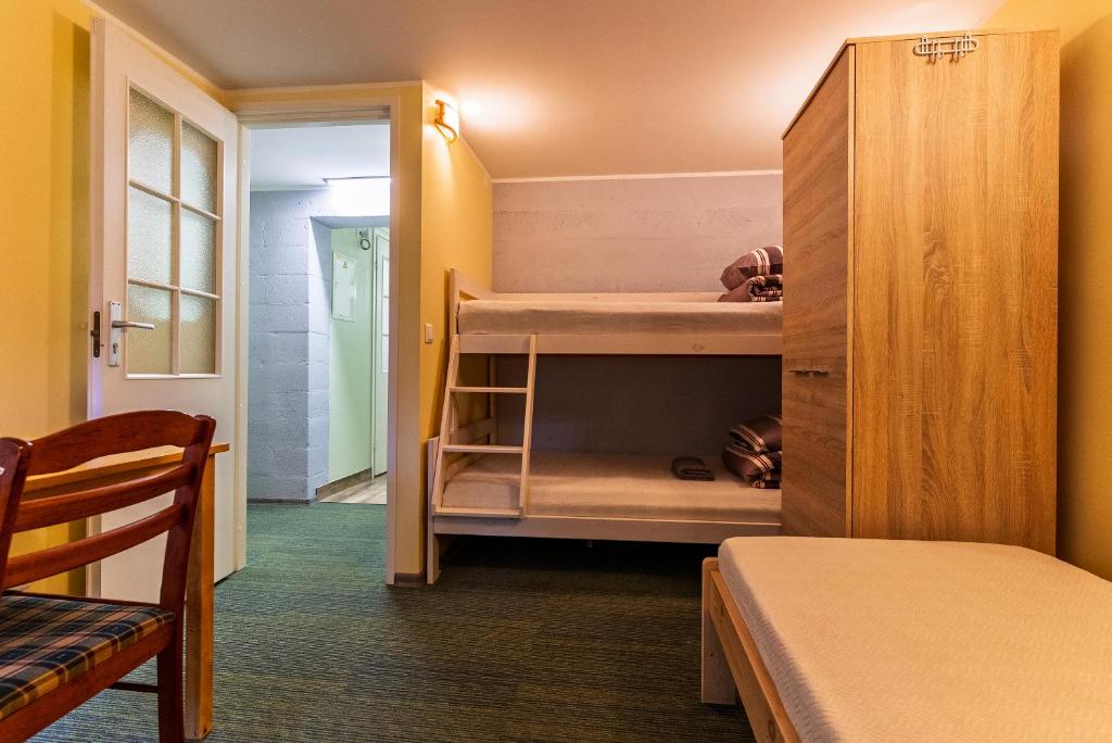 Postel nebo postele na pokoji v ubytování IDA Apartments