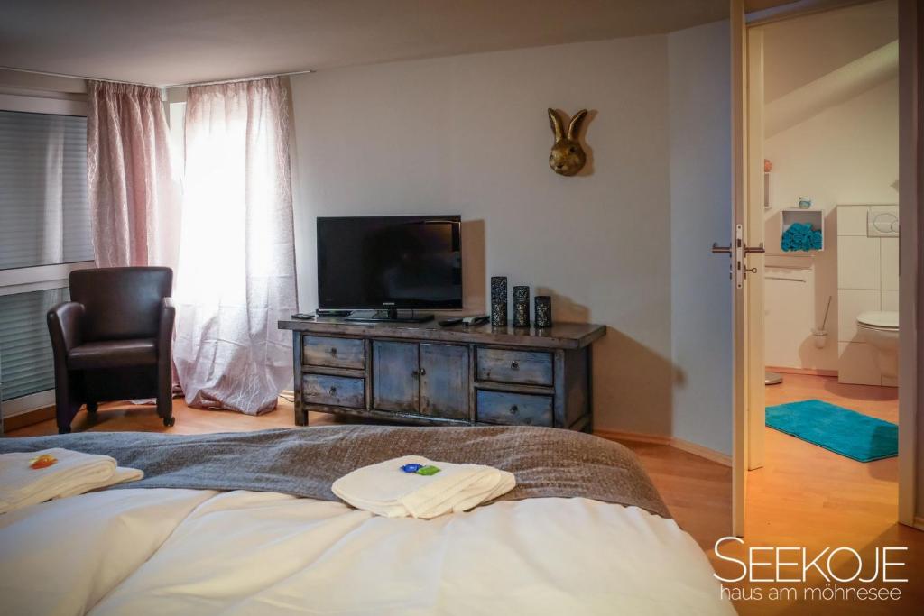 Postel nebo postele na pokoji v ubytování Seekoje - Haus Am Möhnesee