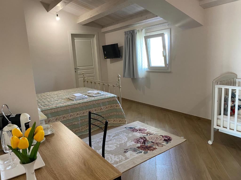 Postel nebo postele na pokoji v ubytování Villa Giusy