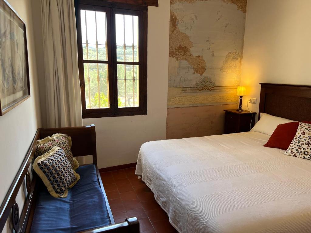 Cama o camas de una habitación en La Bodega Enoturismo Rural