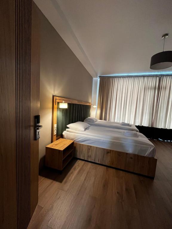 Postel nebo postele na pokoji v ubytování Kakhri Resort